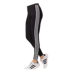 Black leggings with white side stripes, paired with white sneakers, ideal for gym or casual wear.