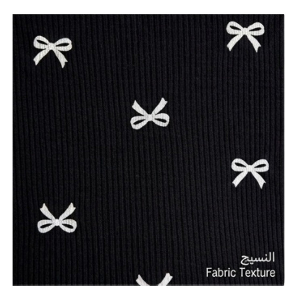 Maaak.store black cotton lycra fabric with a white bow print pattern for a comfortable home abaya