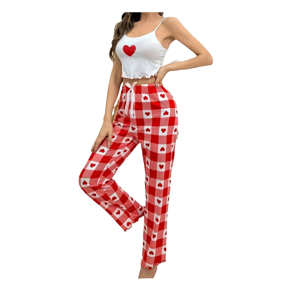 Maaak.store cotton pajama set with white heart-print camisole and red plaid heart-pattern trousers on a model