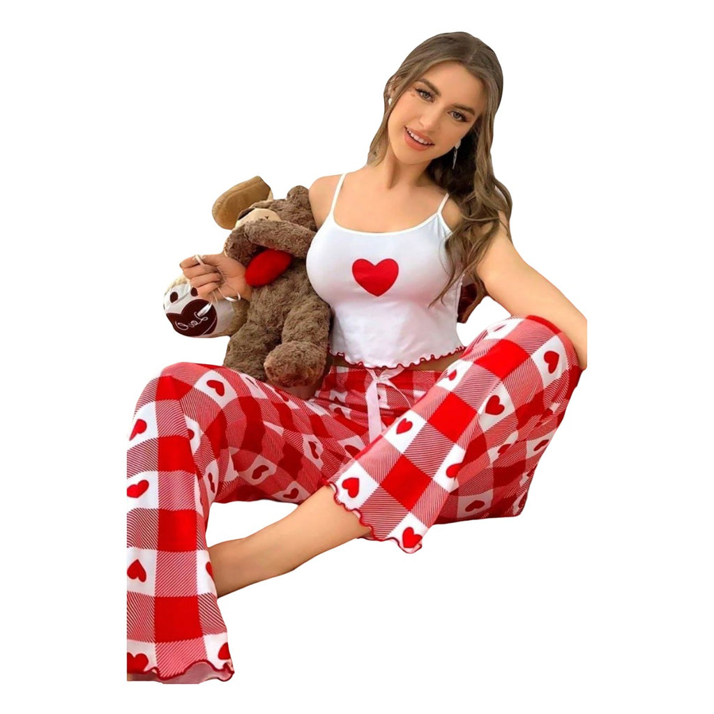 Maaak.store cotton pajama set with white heart-print camisole and red plaid pants worn by a smiling woman