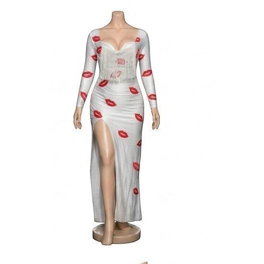 Maaak.store white maxi dress in soft butter fabric with red lip print, long sleeves, chest fringe, and side slit.
