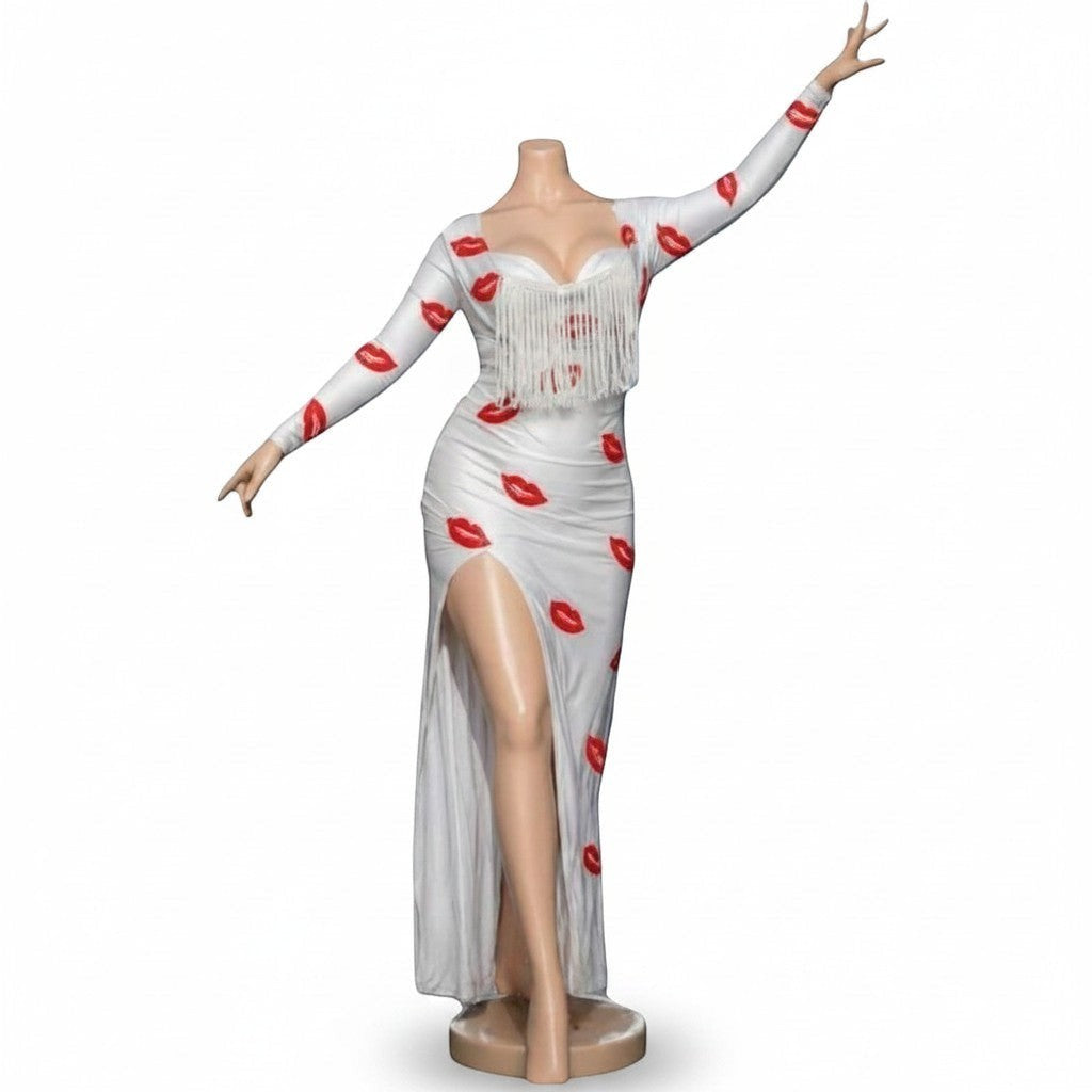 Maaak.store white maxi dress with red lip print, long sleeves, chest fringe, and high side slit on a mannequin